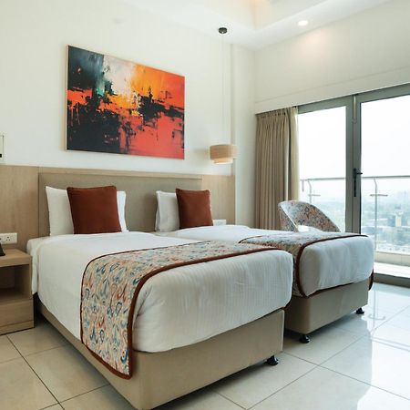 Ar Suites Klj Square Gurgáon Kültér fotó