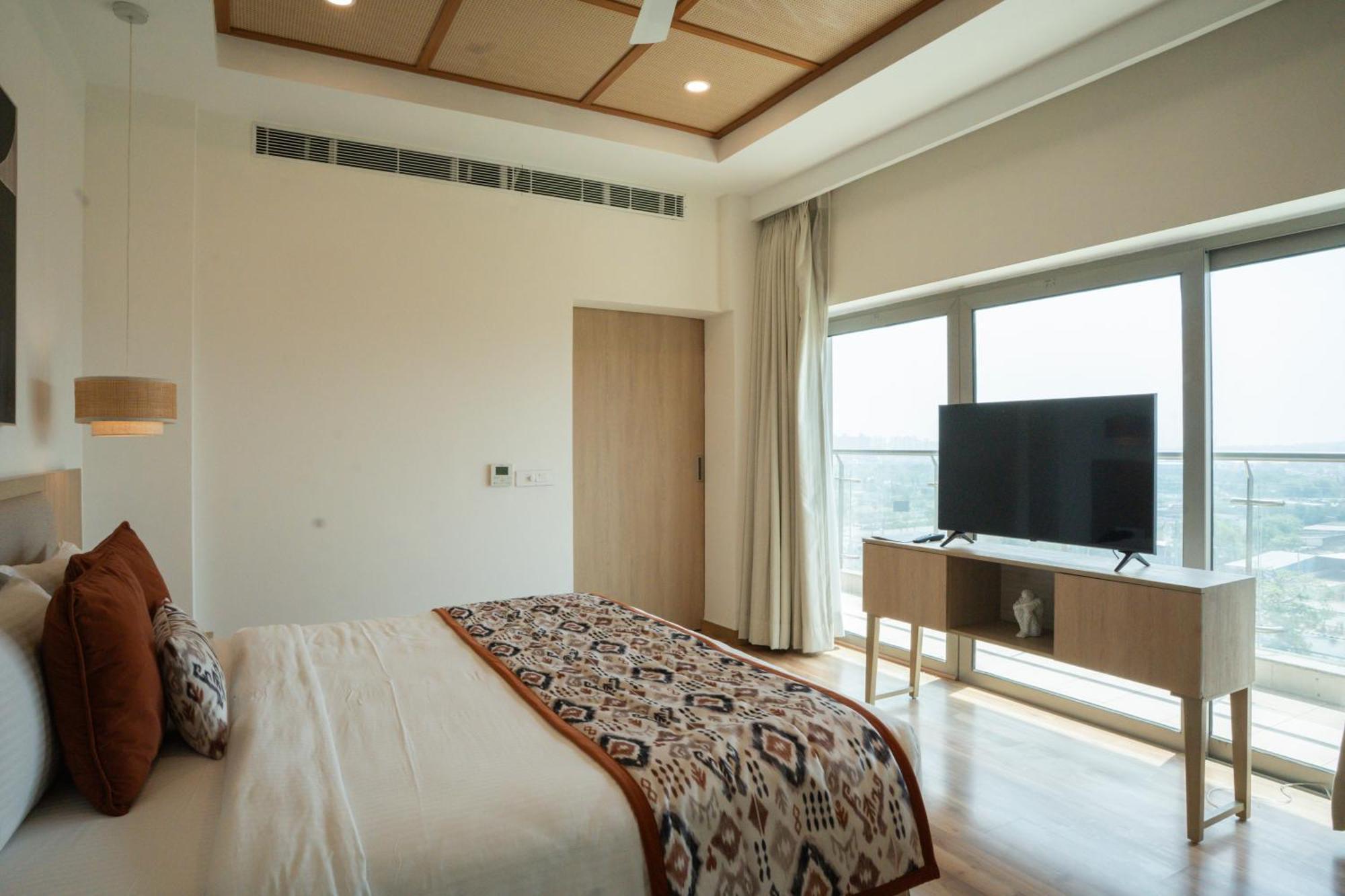 Ar Suites Klj Square Gurgáon Kültér fotó